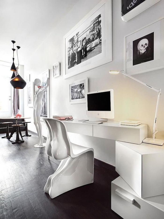 white desk and drawers, white statue and chair, home ideas, black wooden floor, white wall with paintings