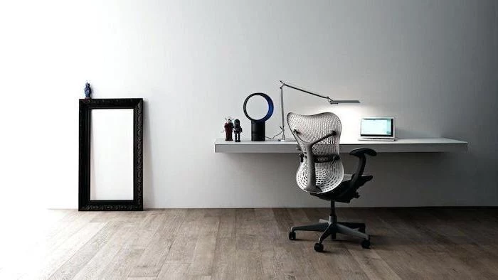 wooden floor, white desk mounted on wall, white mesh chair, office ideas, small metal desk lamp