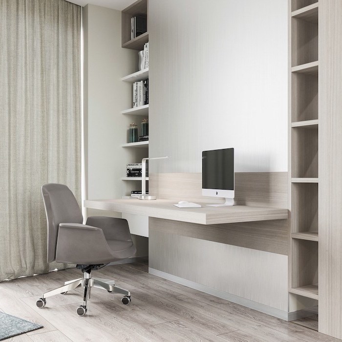 wooden bookshelves, grey velvet chair, wooden desk with a small desk lamp, office ideas, desktop computer