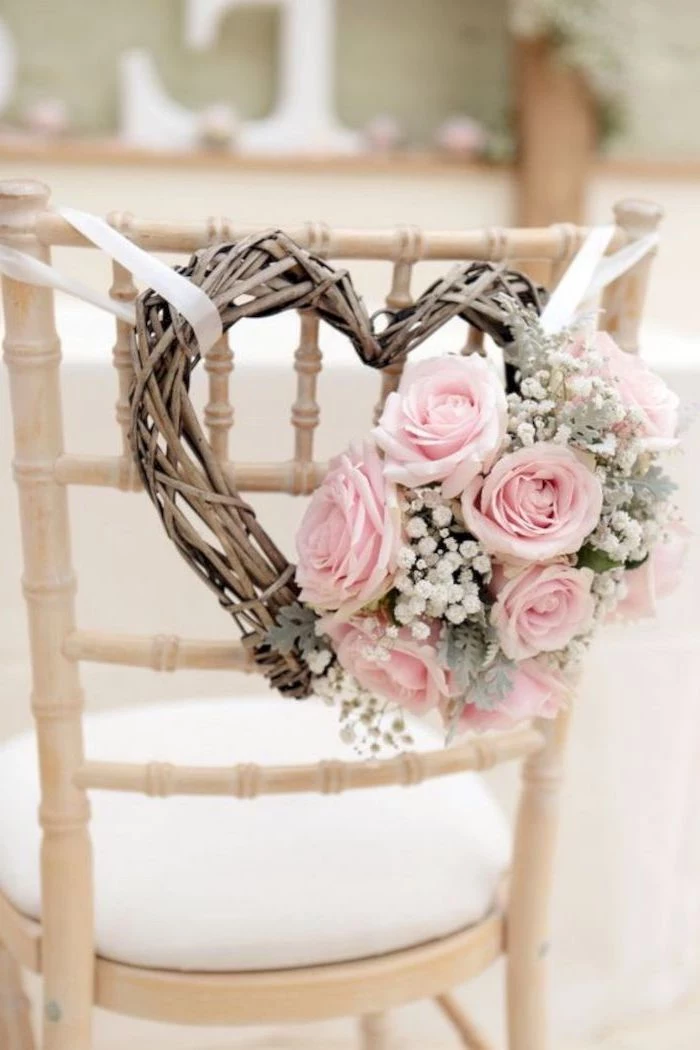 wooden heart with pink roses flower bouquet, white chair, wedding reception decoration ideas