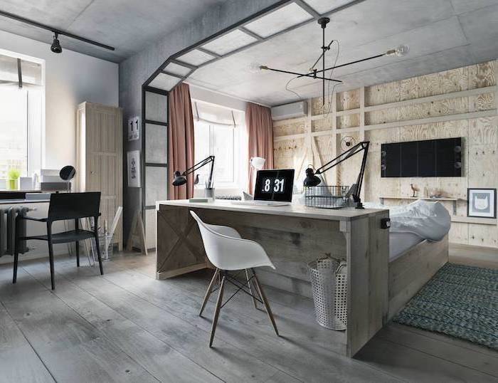 work office decor, wooden wall and desk, white chair, black metal desk lamps