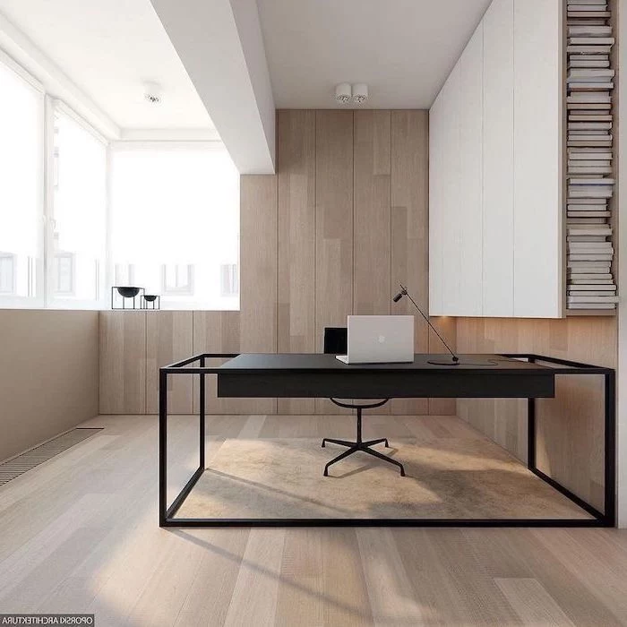 wooden wall and floor, beige velvet rug, black desk and chair, home office design, laptop and desk lamp on the desk