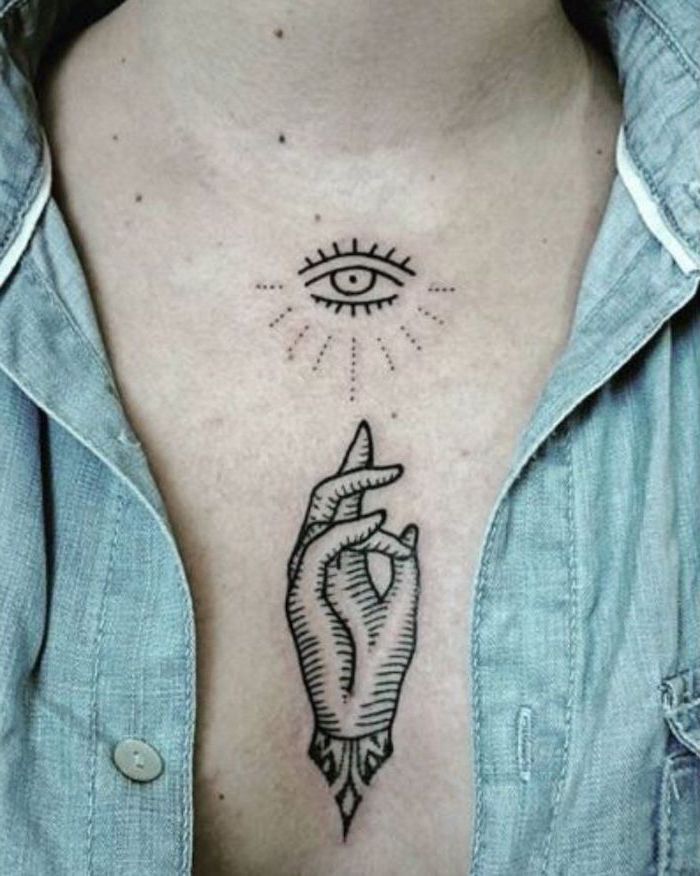 the all seeing eye, praying hand, small tattoos for men, religious theme, chest tattoos, denim shirt