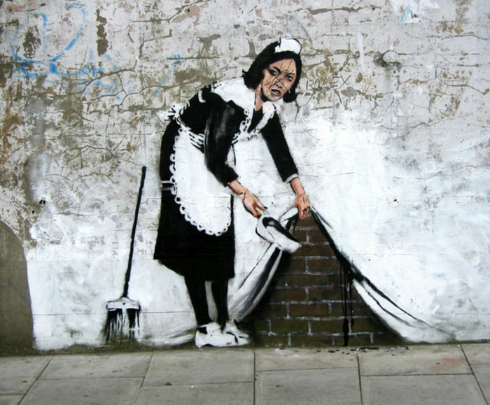 cute girl drawing, banksy inspired street art, maid cleaning up, drawing on the wall