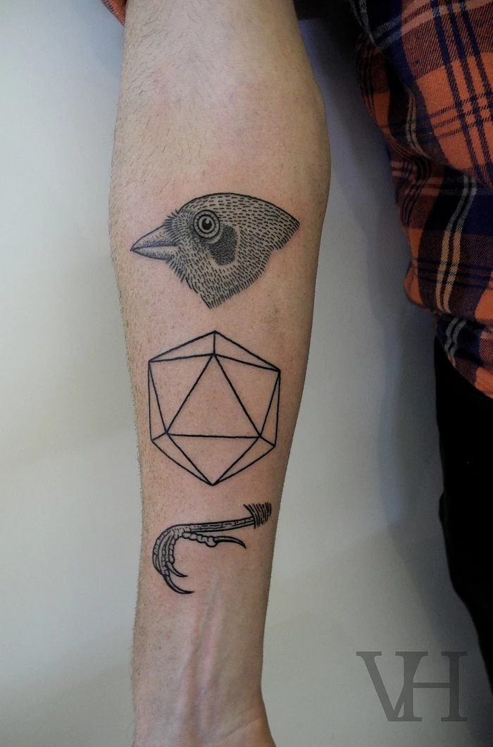 flower of life tattoo, bird head and claws, hexagon in the middle, forearm tattoo, plaid shirt