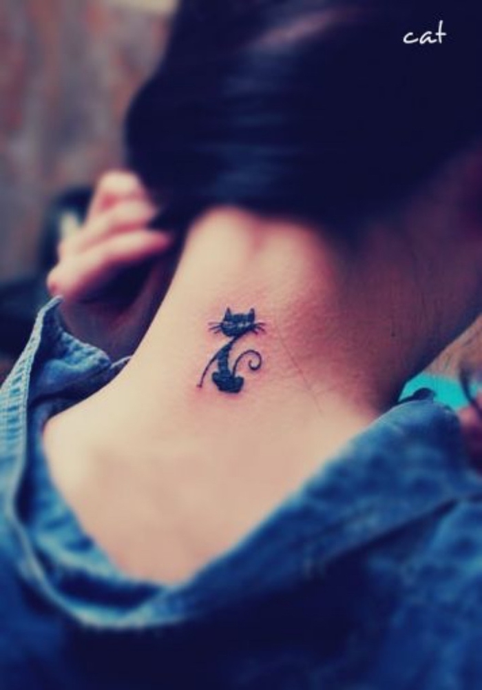 black cat back tattoo, woman pulling her black hair back, small tattoos for men, woman wearing a shirt