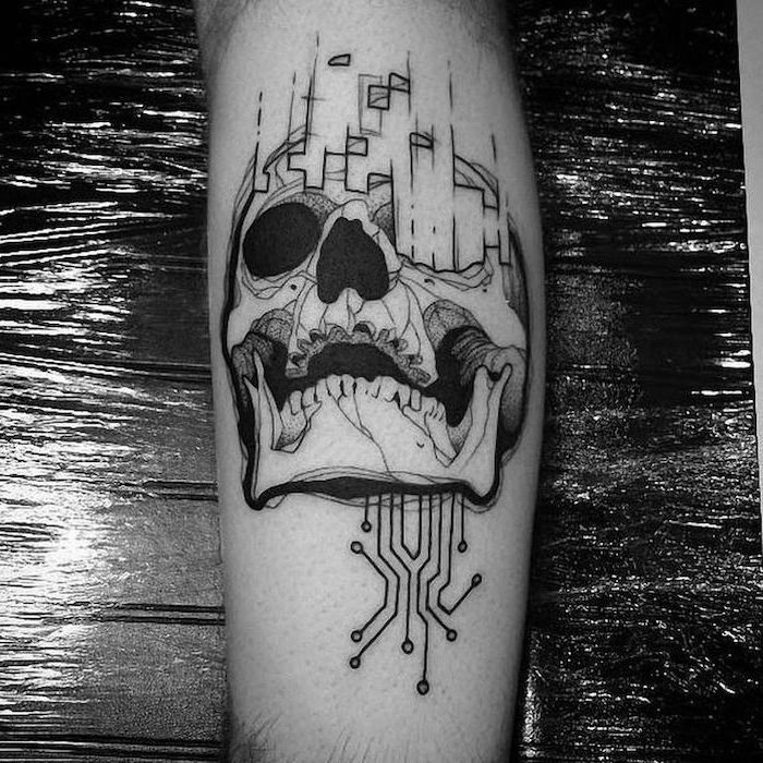 intricate skull design, leg tattoo, forearm tattoos, leg lying on a surface, covered in nylon