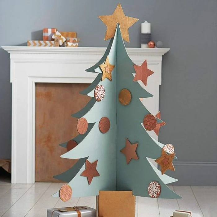 white tiled floor, cardboard shelves, cardboard christmas tree, with ornaments and a star
