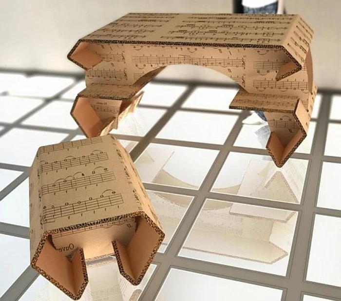 cardboard furniture diy, musical notes printed on the cardboard, cardboard table and stool