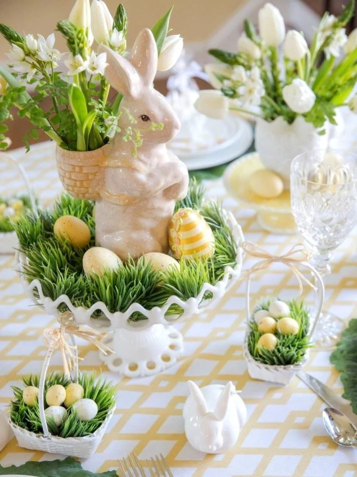 ceramic bunny figurines, bouquets of white flowers, simple table decorations, dyed eggs