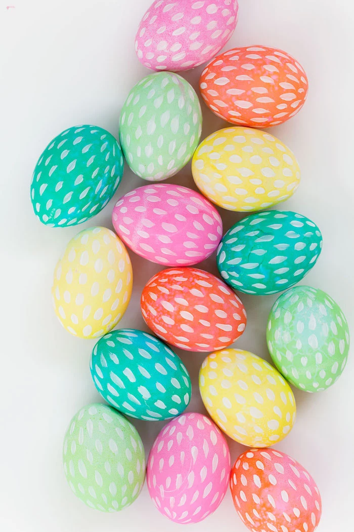 white paintbrush strokes, colourful dyed eggs, on a white background, how to dye easter eggs, diy tutorial