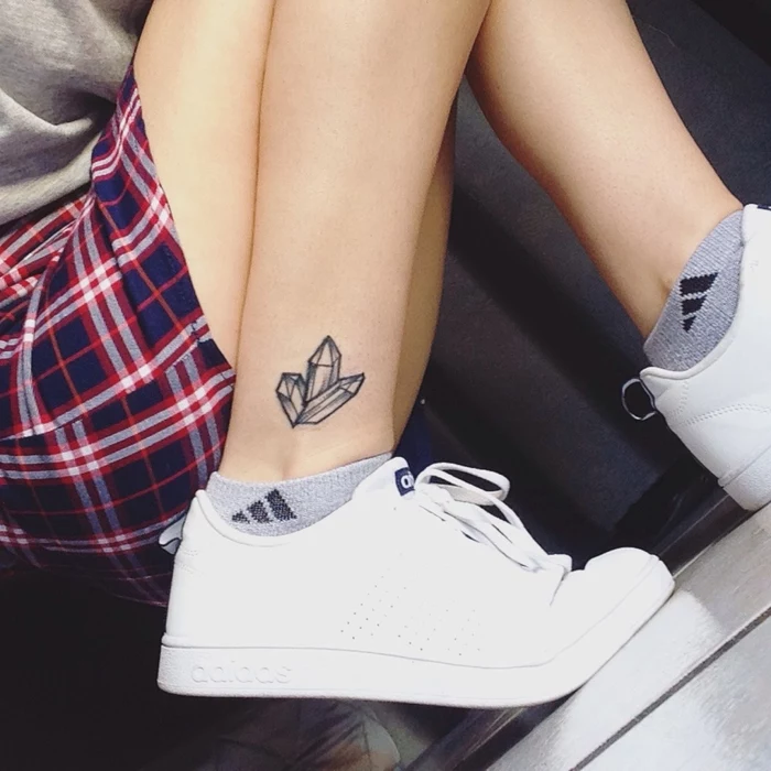 white sneakers, black and white crystals ankle tattoo, sacred geometry tattoo, plaid shirt