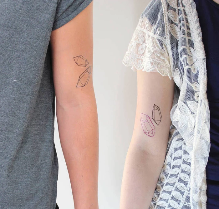 matching couple tattoos, crystals on the inside of the arm, sacred tattoo, white background