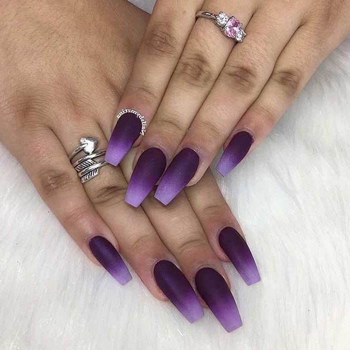 light and dark purple ombre nail polish, pink nail designs, long coffin nails, diamond ring on the middle finger