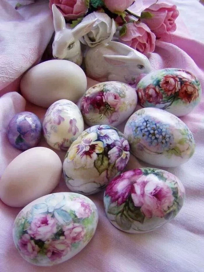 floral painted eggs, ceramic bunny figurines, natural egg dye, pink cloth, bouquet of flowers