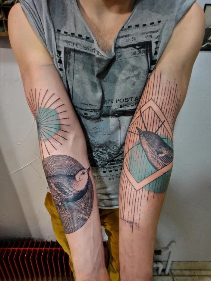 tattoos on both arms, flying birds, surrounded by geometrical shapes, geometric tattoos