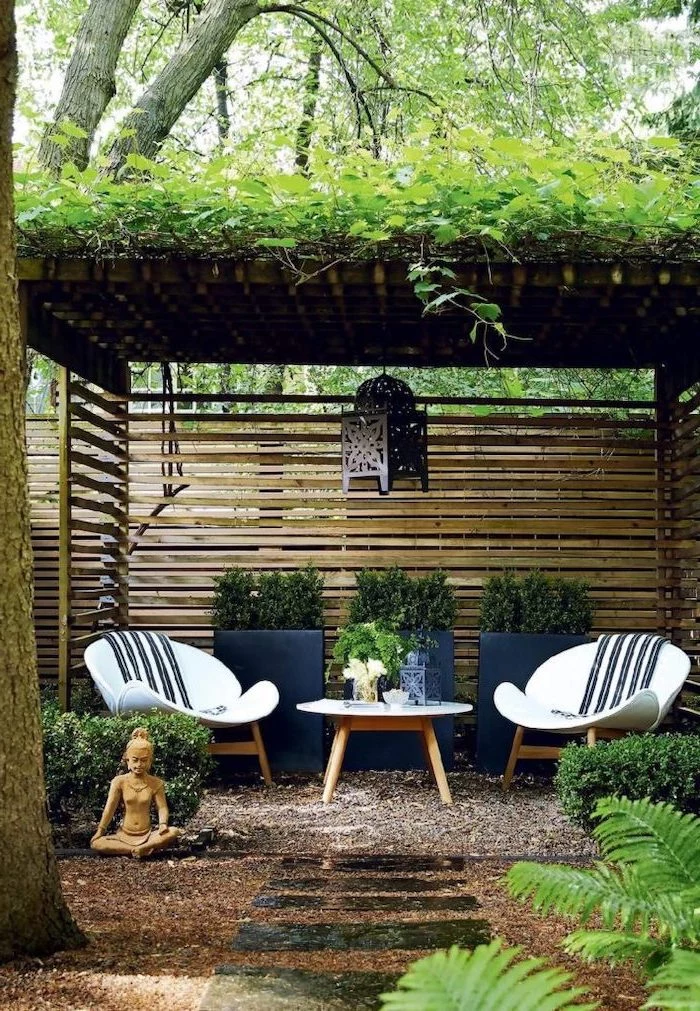small garden shed, garden furniture underneath, garden design ideas, potted plants, tiled pathway
