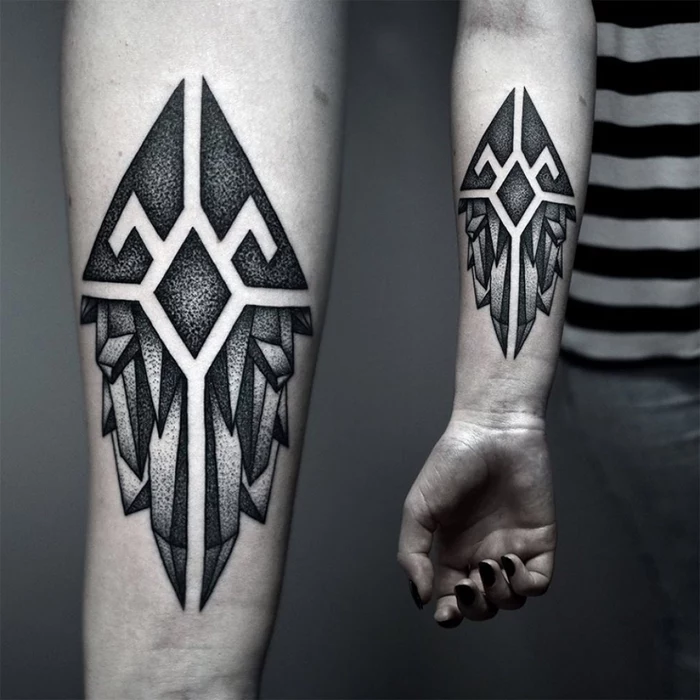 black nail polish, geometric animal tattoos, geometrical forearm tattoo, grey background