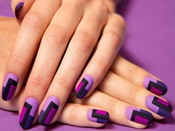 geometrical manicure, nail design ideas, pink black and purple matte nail polish, purple background