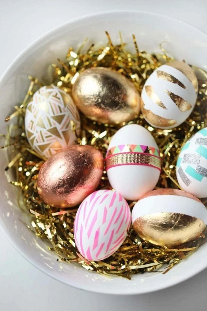 gold and pink, geometrical design, dyed eggs, in a white bowl, how to make easter eggs