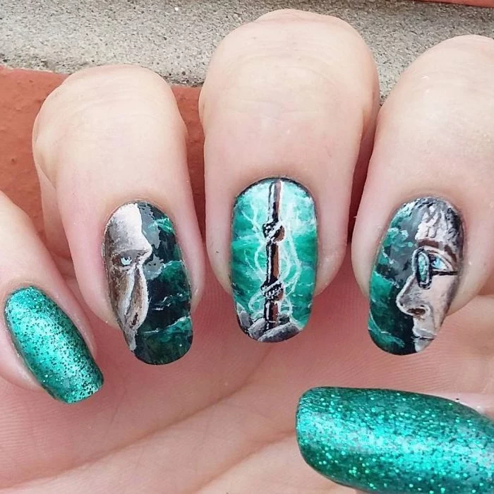 green nail polish, harry potter inspired manicure, nail color ideas, drawings of harry and voldemort, and the elder wand, cute nail designs for long nails