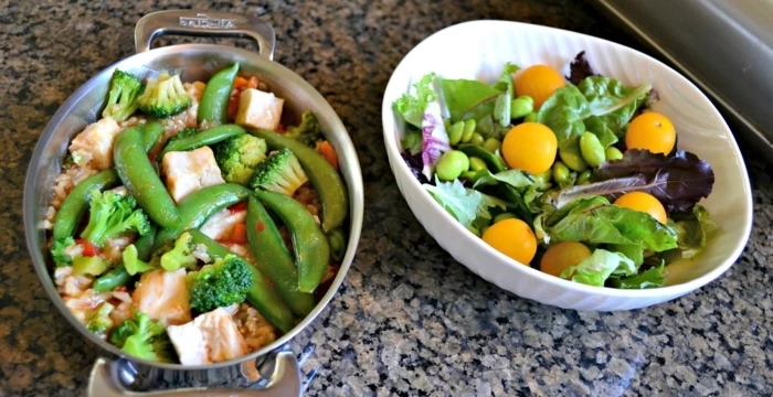 green salad, cherry tomatoes, in a white bowl, best diet for women, meat and peas, in a pot