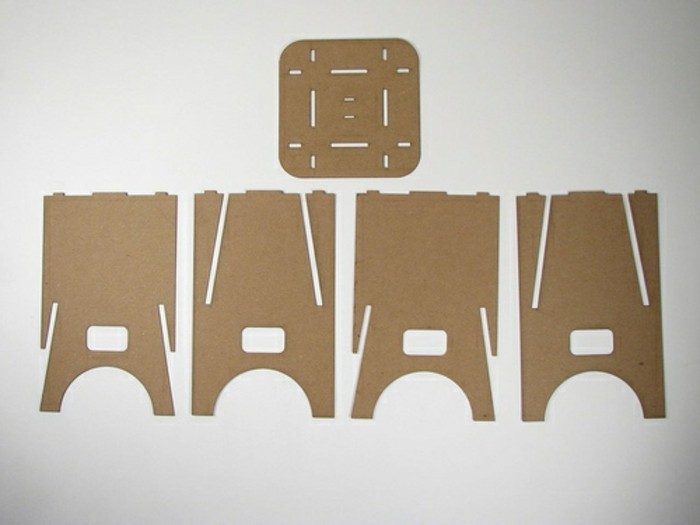 how to make cardboard stools, pieces of the stools, cardboard furniture, white background