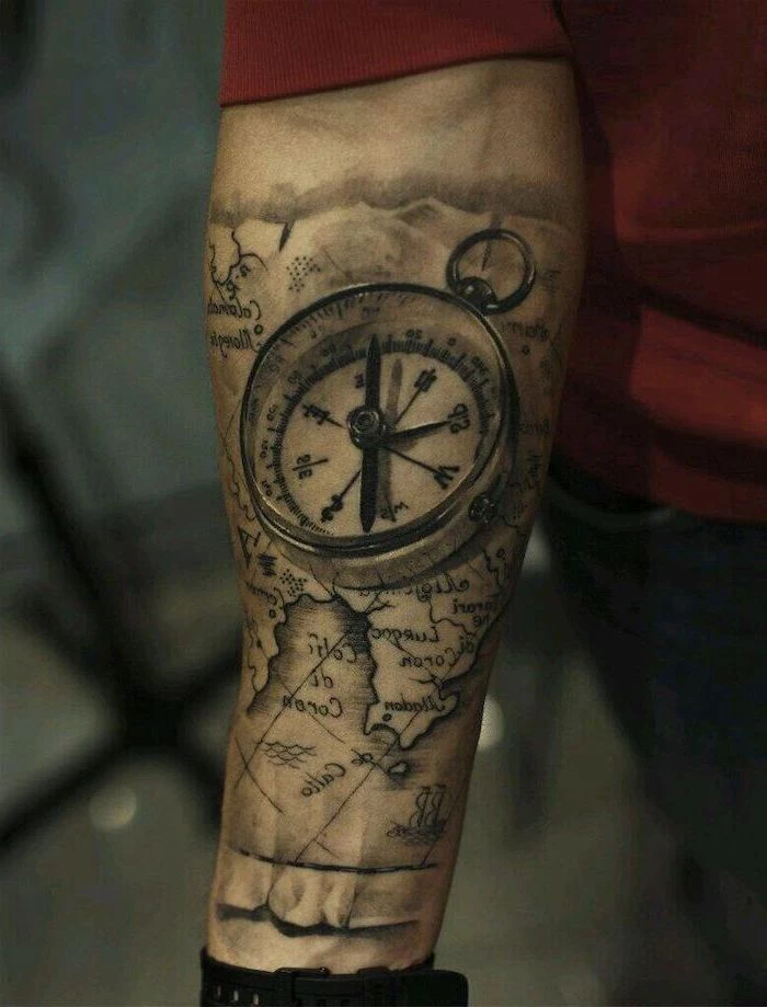 3d compass and map, forearm tattoo, back tattoos for men, man wearing red blouse
