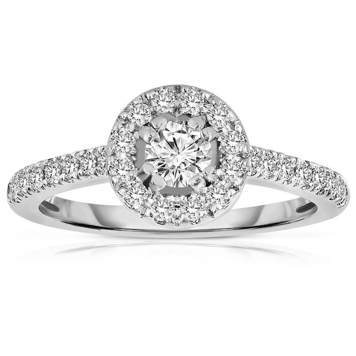 teardrop engagement ring, large round diamond, surrounded by smaller diamonds, diamond studded band
