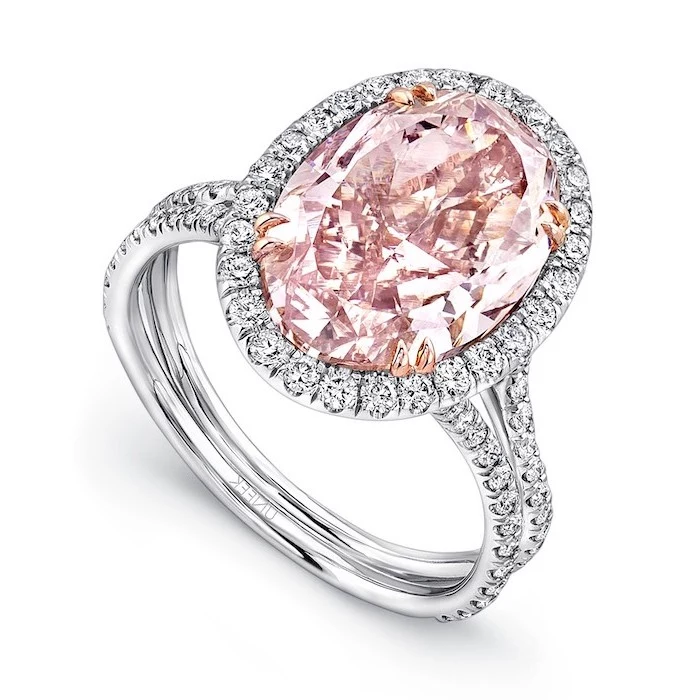 large morganite stone, surrounded by small diamonds, alternative engagement rings, diamond studded band