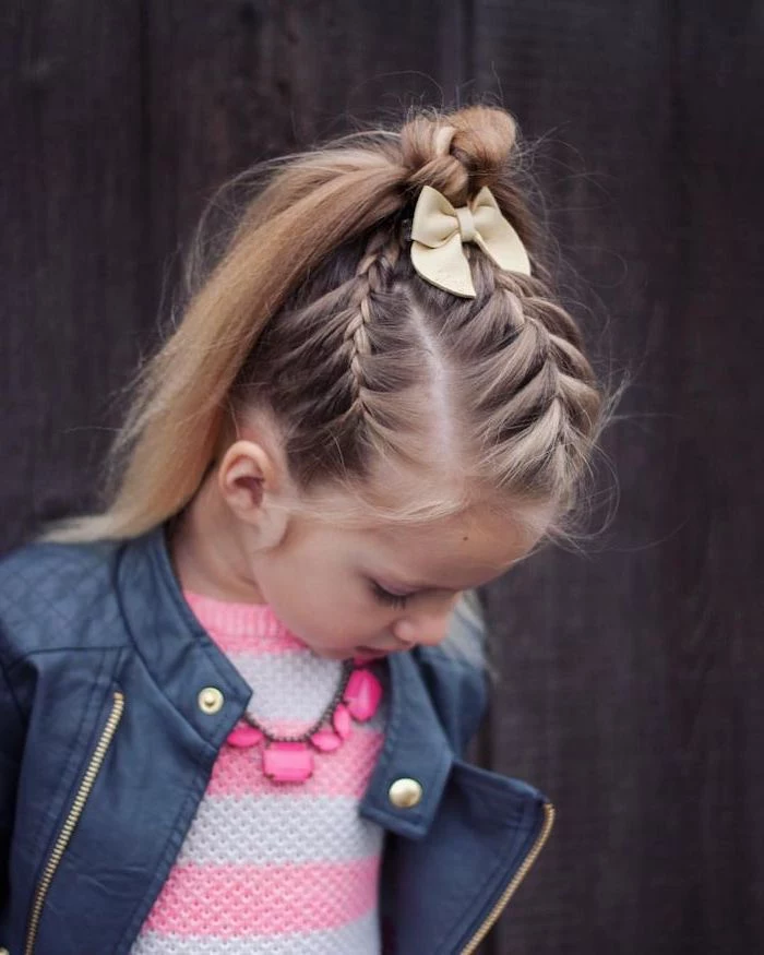 small beige bow, long blonde hair, flower girl hairstyles, braids ending in a ponytail, black leather jacket