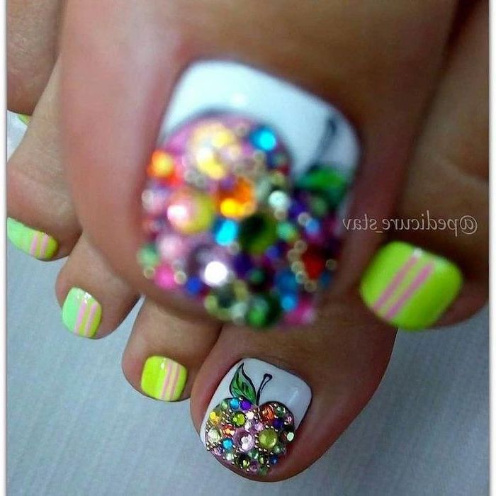 apple shaped with rhinestones on the toe, neon nail polish pedicure, nude nail designs