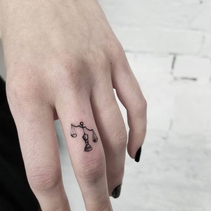 Finger Tattoo Over 70 cool themes and their meaning