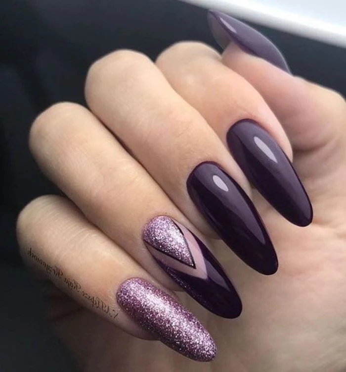 dark purple nail polish, pink glitter nail polish, geometrical shapes drawn on one of the nails, cool nail designs, cute nail designs for long nails