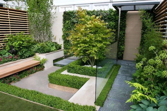 small wooden bench, surrounded by planted bushes and trees, garden patio ideas, planted small hedges
