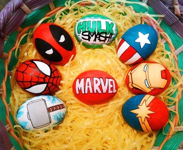 marvel characters inspired, dyed eggs, easter egg coloring ideas, green and purple, plastic basket