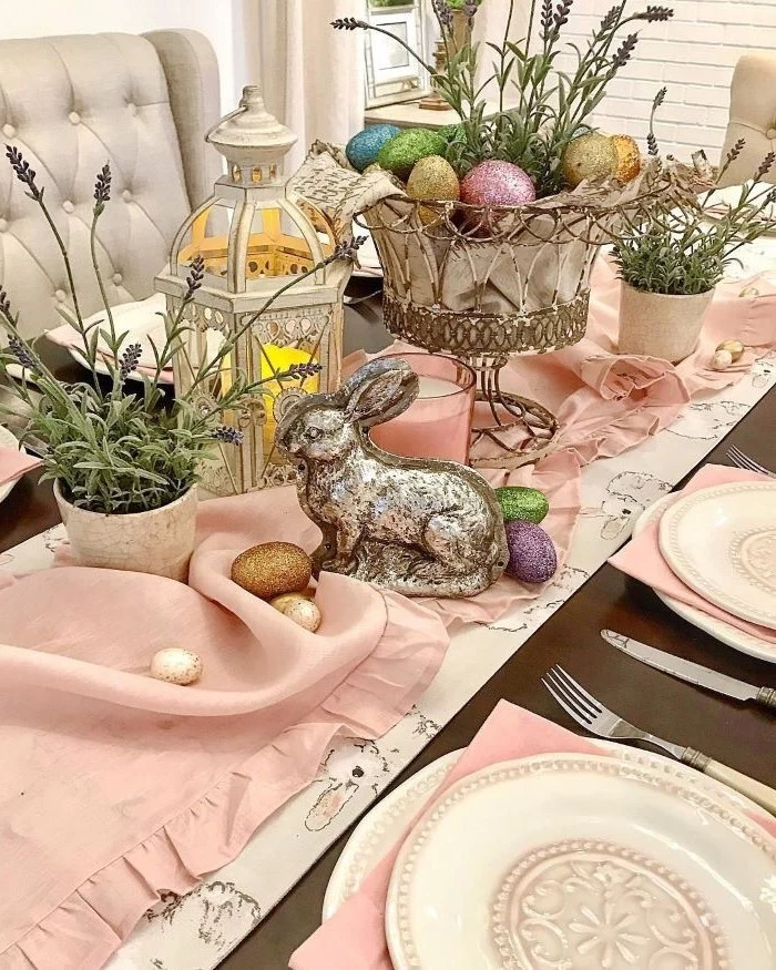potted lavender, metal basket with dyed eggs, easter centerpiece ideas, pink table runner