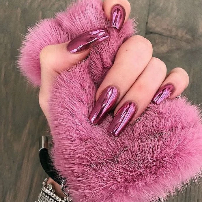 long coffin nails, pink metallic nail polish, cute coffin nails, hand holding pink fur