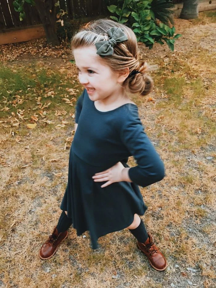 olive green velvet bow, blonde hair in a low side bun, french braid ponytail, navy blue dress