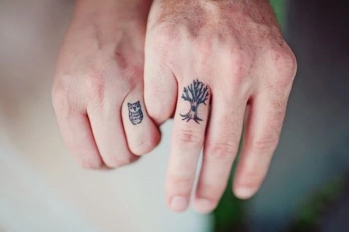 tree and owl finger tattoo, small tattoos tumblr, couples matching tattoos, blurred background