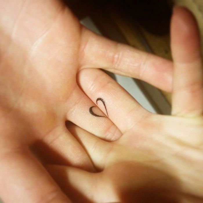 parts of a heart, ring finger tattoo, intertwined hands, cute finger tattoos, his and hers tattoo
