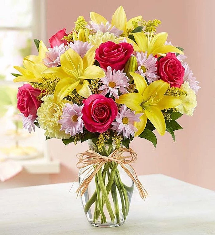 yellow pink and red roses, flower bouquet, in a small round vase, how to make flower arrangements