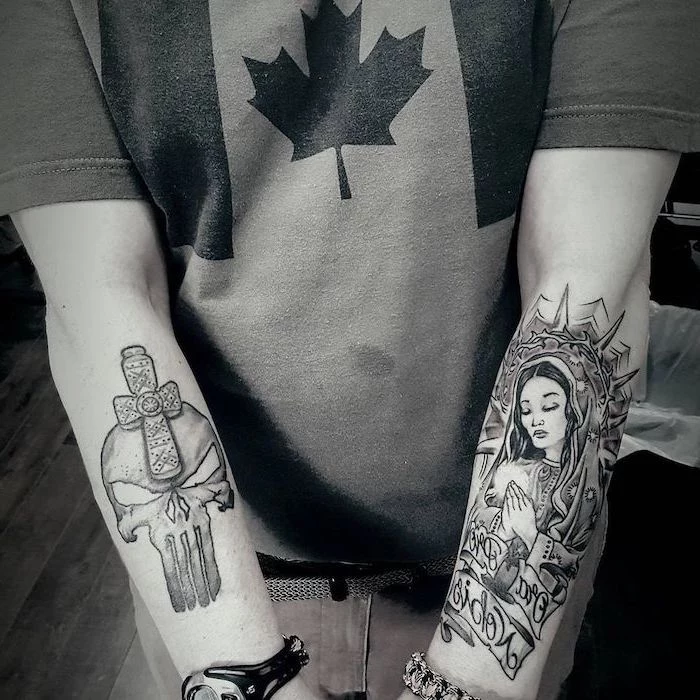 punisher forearm tattoo, religious icon forearm tattoo, tattoos for men with meaning, canada flag shirt