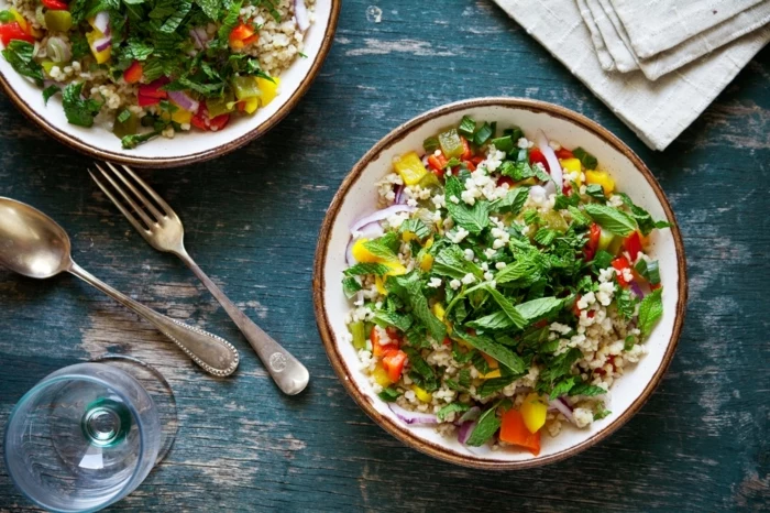 bulgur salad, with mint and vegetables, in white bowls, 7 day healthy eating plan, blue rustic table