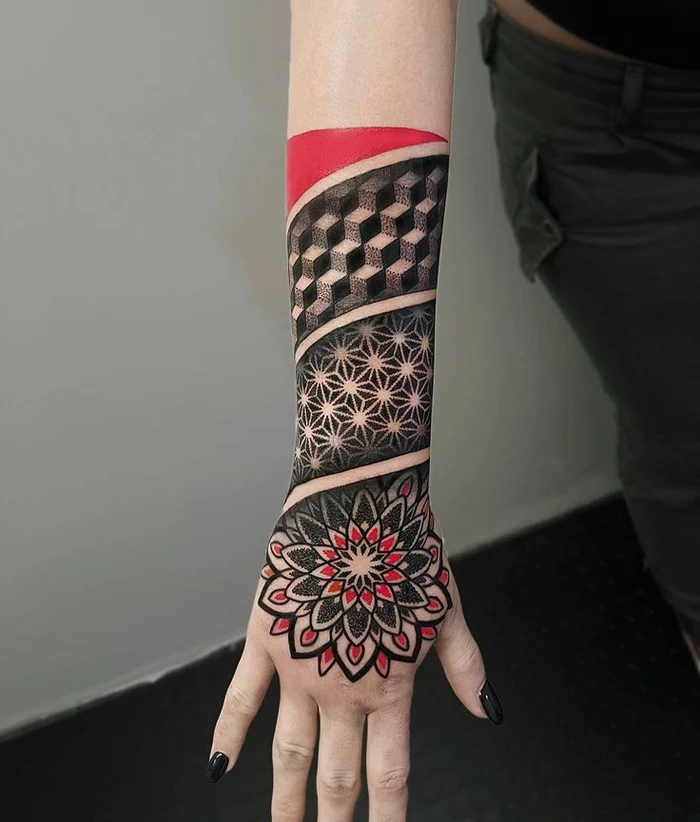 red and black tattoo, covering the wrist and forearm, geometric tattoo designs, white background