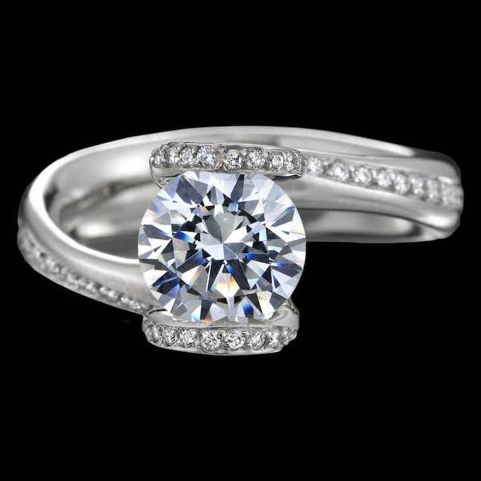 large round diamond, black background, non traditional wedding rings, diamond studded band