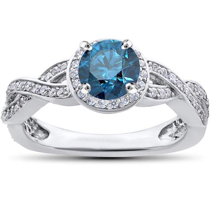 large round sapphire, diamond studded white gold band, non traditional wedding rings