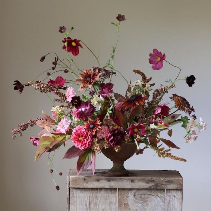rustic style, beautiful flower arrangements, large colourful flower bouquet, on a wooden table