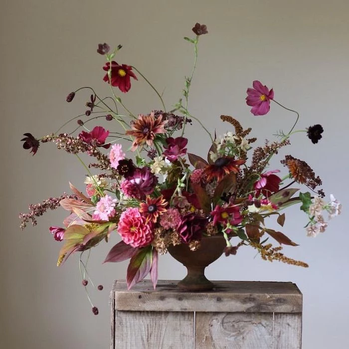 rustic style, beautiful flower arrangements, large colourful flower bouquet, on a wooden table