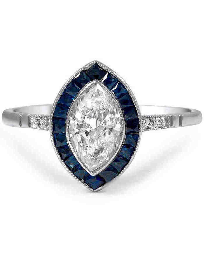diamond surrounded by sapphires, white gold band with diamonds, unique wedding rings for women